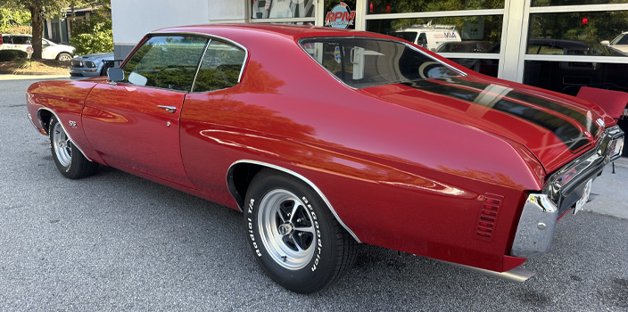 RPM Autoworx | Cars parked front of the shop